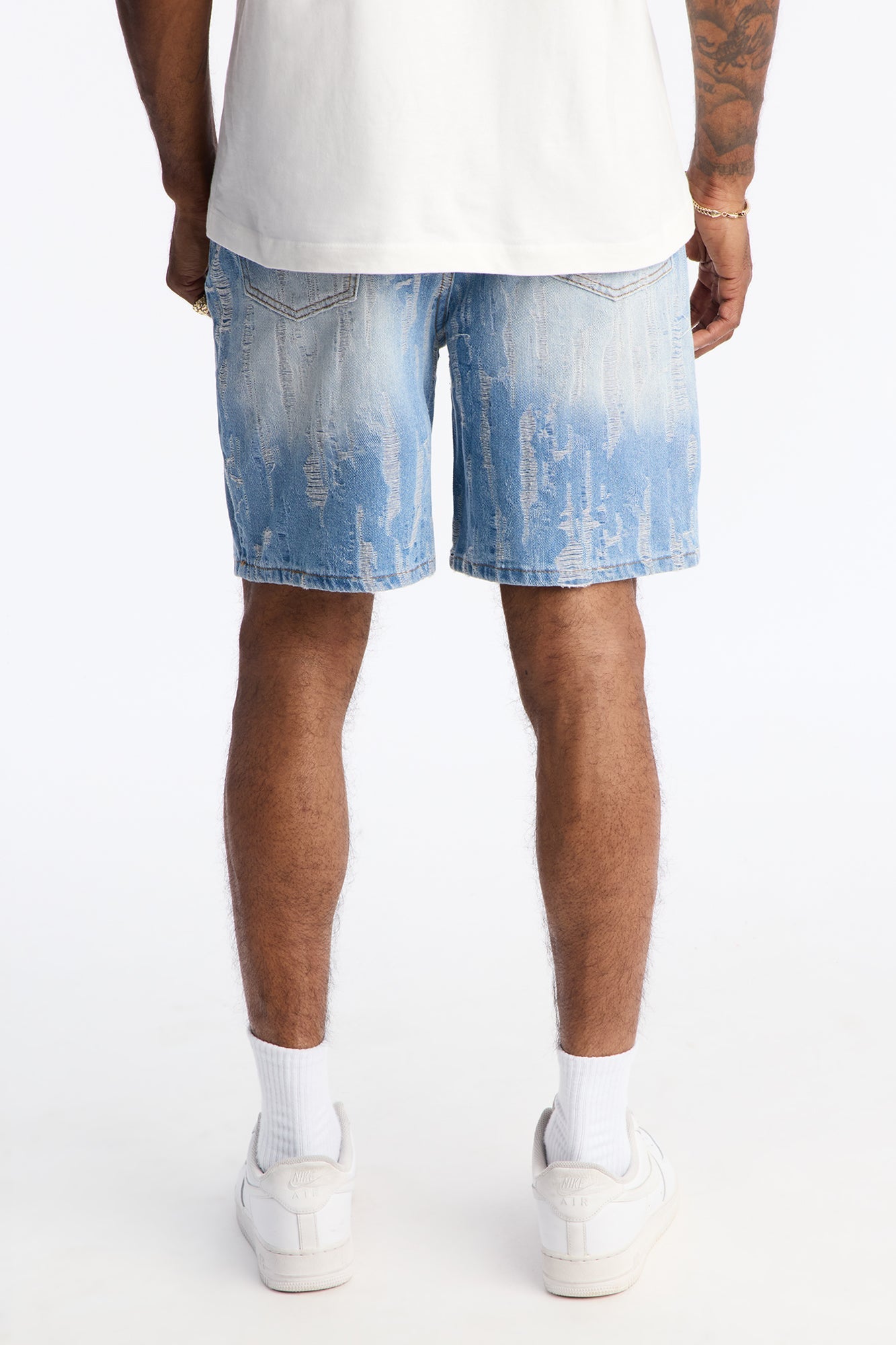 Relaxed All Over Distressed Denim Short - Medium Wash