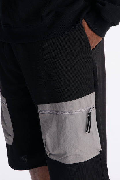 Relaxed Asymmetrical Waffle Tech Short - Black