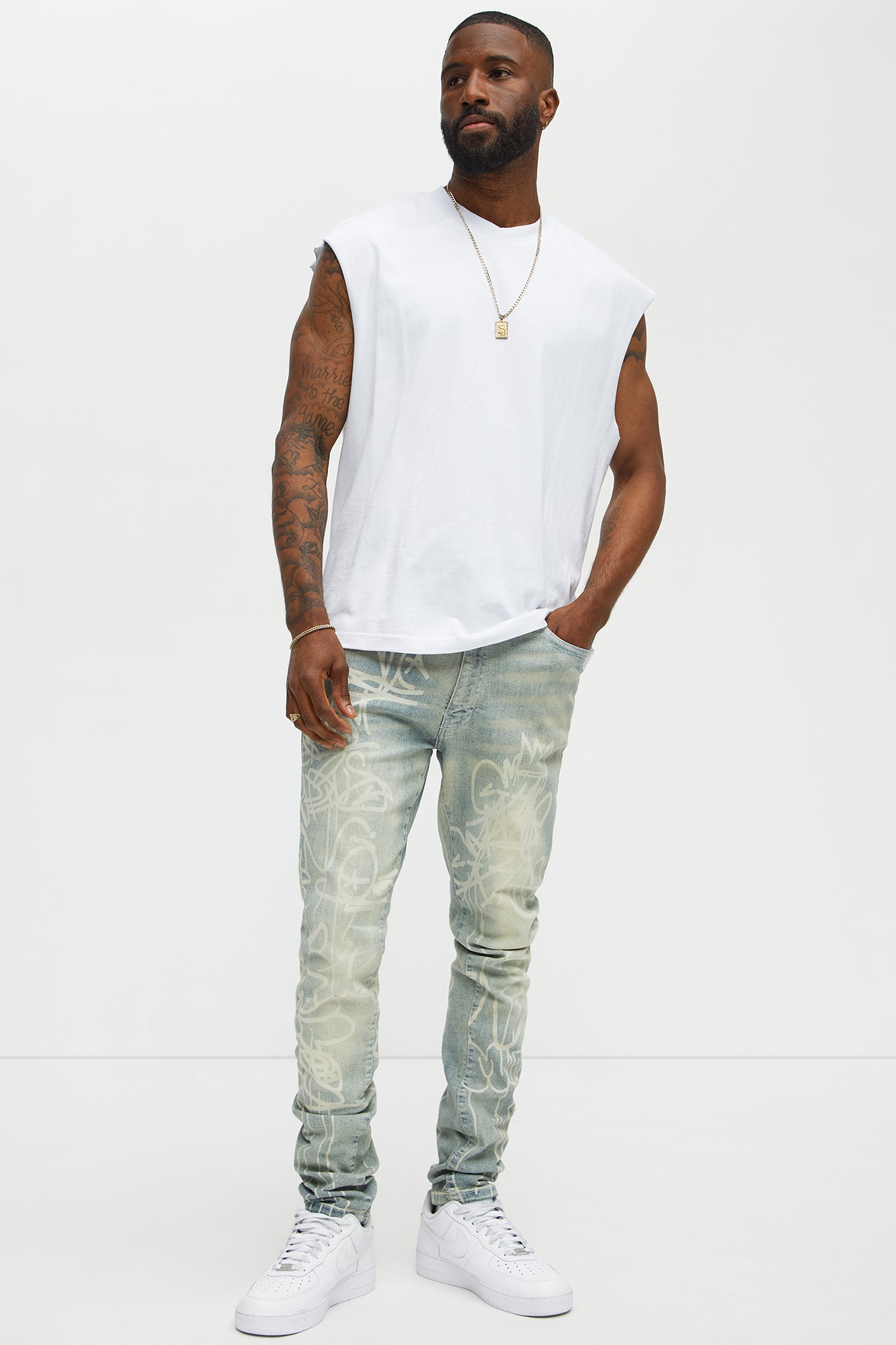 Graffiti Art Stacked Skinny Jeans - Light Wash