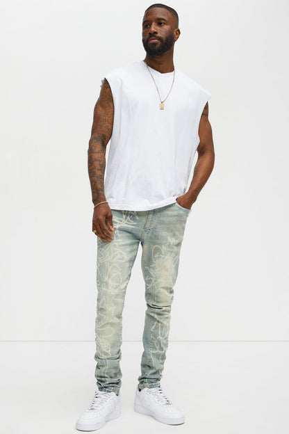 Graffiti Art Stacked Skinny Jeans - Light Wash