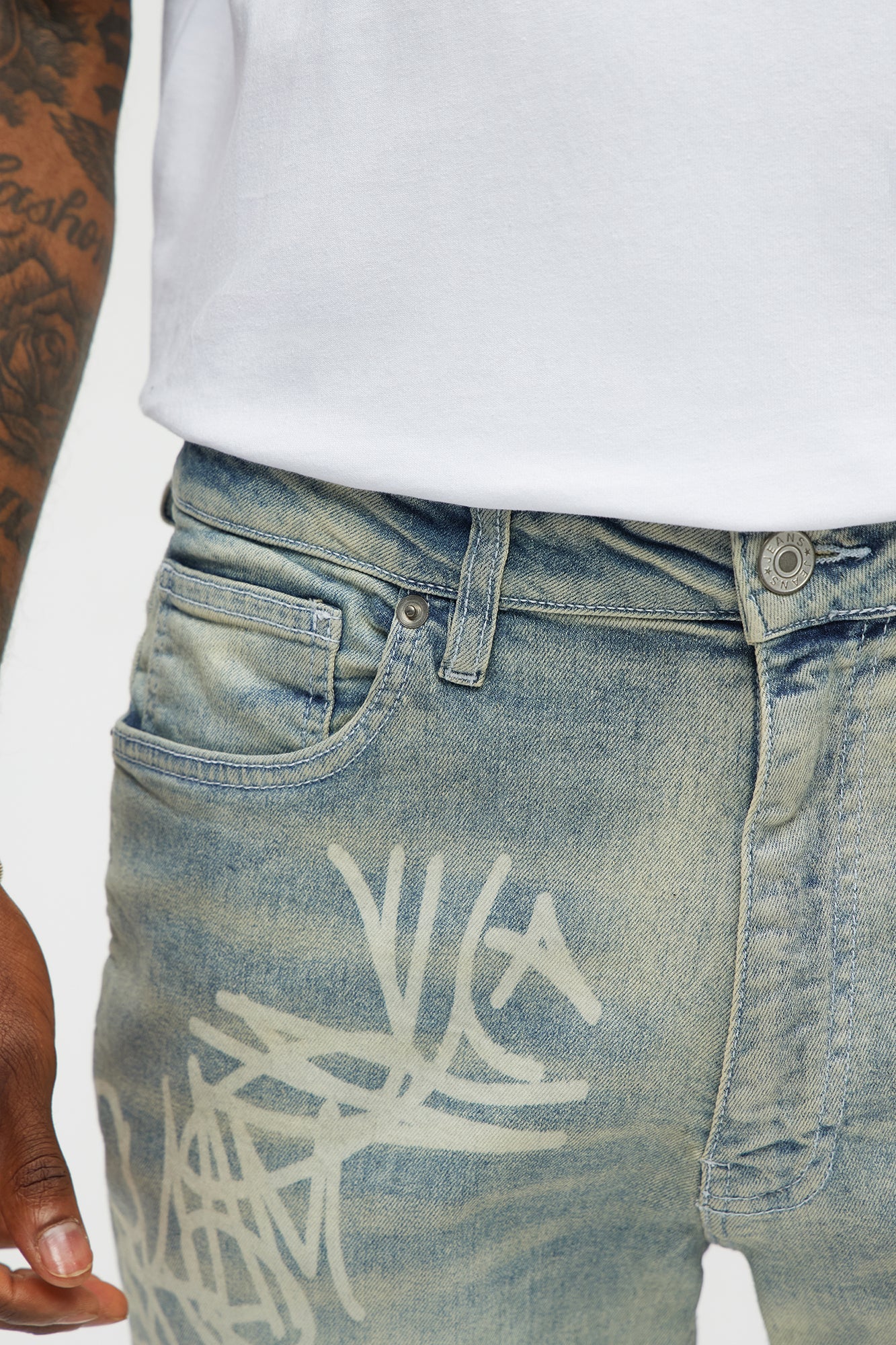 Graffiti Art Stacked Skinny Jeans - Light Wash