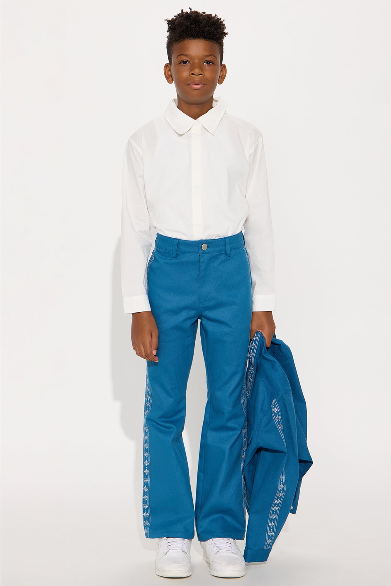 Mini Stacked Slim Flare On A Loop Embroidered Stitch Pant - Blue