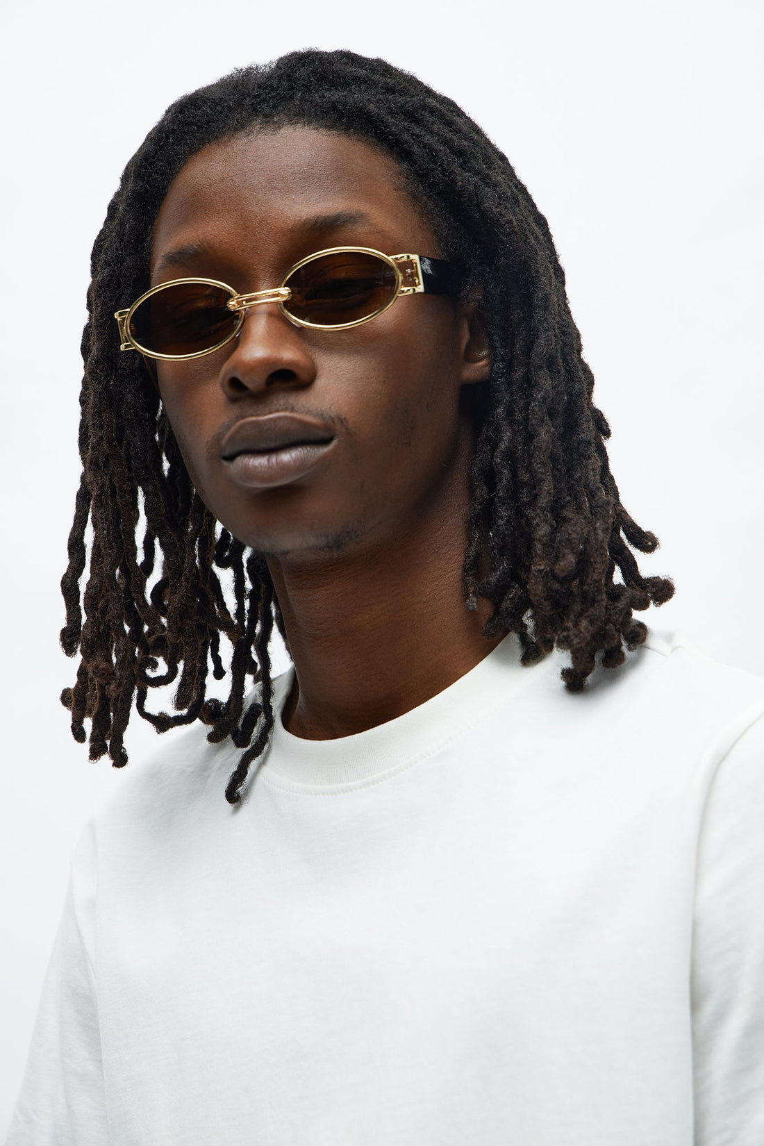 Sleek Oval Frame Colored Lens Sunglasses - Brown