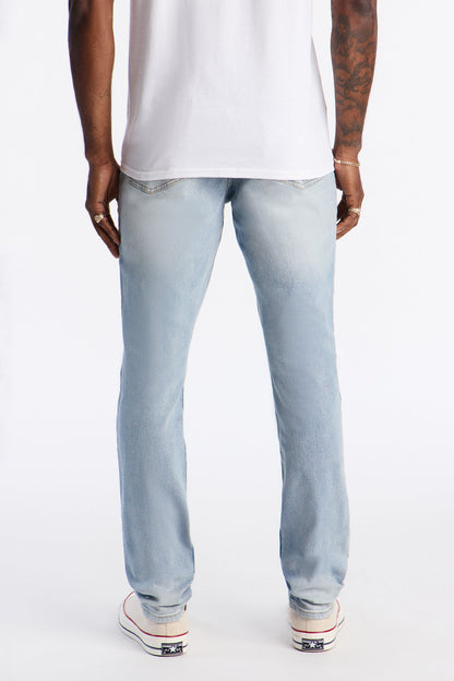 Stacked Skinny Off Hours Paint Splatter Jean - Light Blue Wash