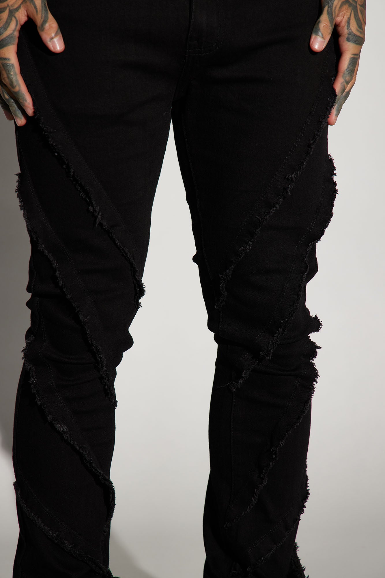 Slanted Fray Stacked Skinny Flare Jeans - Black