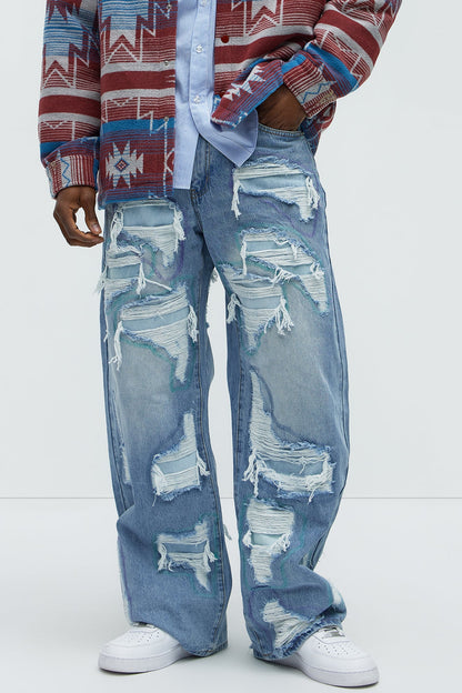 Worn All Over Distressed Baggy Jeans - Light Wash