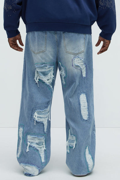 Worn All Over Distressed Baggy Jeans - Light Wash