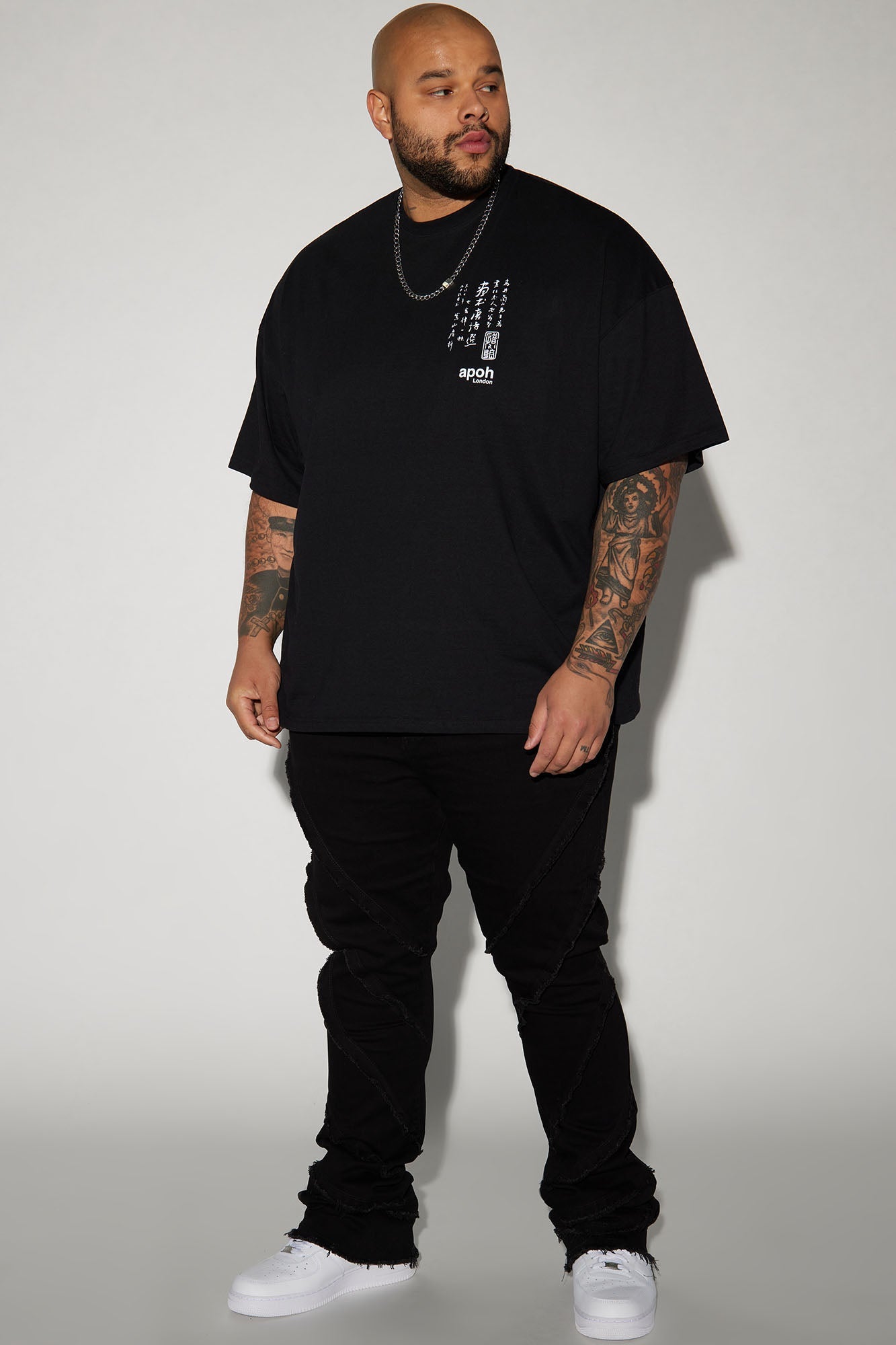 Slanted Fray Stacked Skinny Flare Jeans - Black