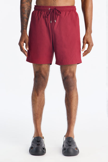 Montez Stretch Swim Trunk 7″ - Burgundy
